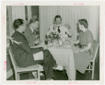 Electric Utilities - Electrified Farm - Grover Whalen with Mr. and Mrs. Moulton at dinner