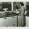 Electric Utilities - Electrified Farm - Woman in kitchen