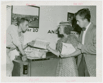 Electric Utilities - Electrified Farm - Woman and two men with food