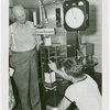 Electric Utilities - Electrified Farm - Men with Electric Pasteurizer