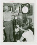 Electric Utilities - Electrified Farm - Men with Electric Pasteurizer