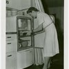 Electric Utilities - Electrified Farm - Mrs. Moulton gets food from refridgerator