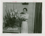 Electric Utilities - Electrified Farm - Mrs. Moulton arranges flowers