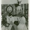 Electric Utilities - Forward March of America - Women talking on couch