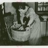 Electric Utilities - Forward March of America - Woman washing clothes
