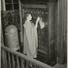 Electric Utilities - Woman filing in office