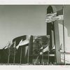 Electrical Products Building - Exterior with flags and scaffolding