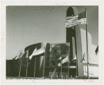 Electrical Products Building - Exterior with flags and scaffolding