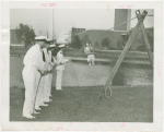 Elgin National Watch Co. Participation - Woman being pulled on inner tube