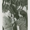 Elgin National Watch Co. Participation - Gladys Swarthout looks into telescope