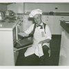 Elmer (NYWF mascot) - Taking pie out of oven