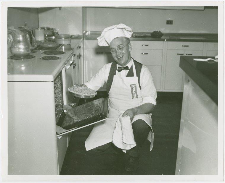 Taking pie out of oven