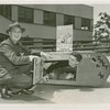 Elmer (NYWF mascot) - With kid in go-cart