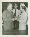 Doris Fontaine (American Airlines Stewardess) receives watch