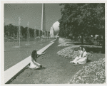 Fairgrounds - Landscaping - Women sitting among flowers in Central Mall