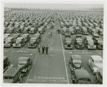 Fairgrounds - Parking and Transportation - Cars and people in parking field