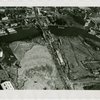 Fairgrounds - Pre-Construction - Flushing River with bridge under construction, aerial view