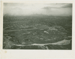 Fairgrounds - Views - Aerial - Site under construction with Manhattan skyline
