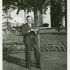 Fairgrounds - Visitors - Man writing in book under tree