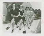 Fairgrounds - Visitors - Four women holding frogs