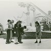 Fairgrounds - Visitors - Children look at shadow of sundial