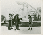 Fairgrounds - Visitors - Children look at shadow of sundial