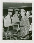 Fairgrounds - Visitors - Women at turnstile