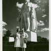 Fairgrounds - Visitors - Two women standing under George Washington statue
