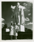 Fairgrounds - Visitors - Two women standing under George Washington statue