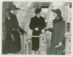 Fairgrounds - Visitors - Guard and women at turnstile