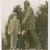 Fairgrounds - Visitors - Man and child in front of Walt Whitman statue