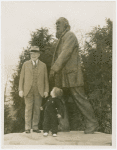 Fairgrounds - Visitors - Man and child in front of Walt Whitman statue