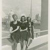 Fairgrounds - Visitors - Three women sitting on handrail of bridge