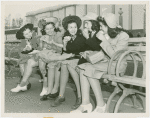 Fairgrounds - Visitors - Group of women picnic on bench
