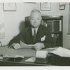 Fairgrounds - Visitors - Man at desk