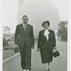 Fairgrounds - Visitors - Man and woman walking in front of Trylon and Perisphere