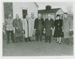 Fairgrounds - Visitors - Group in front of house
