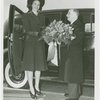 Fairgrounds - Visitors - Woman receiving flowers as she exits car