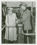 Fairgrounds - Visitors - Elderly - Woman at turnstile