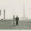 Fairgrounds - Visitors - Woman and man on building roof