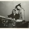 Fairgrounds - Visitors - Woman with man looking at Fair site map