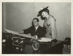 Fairgrounds - Visitors - Woman with man looking at Fair site map