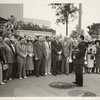 Fairgrounds - Visitors - Grover Whalen with large group in front of Administration Building