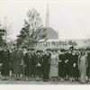 Fairgrounds - Visitors - Group of women with Trylon and Perisphere construction in background