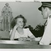 Fashion, World of - Models - Model with guard in front of George Washington statue