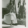 Fashion, World of - Models - Bathing Suits - Model In front of flags