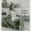 Fashion, World of - Models - Bathing Suits - Woman on lounge chair