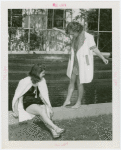 Fashion, World of - Models - Bathing Suits - Two models on side of pool