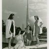 Fashion, World of - Models - Bathing Suits - Group at Court of Communication Fountain with Trylon and Perisphere in background
