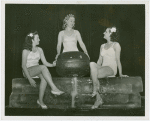 Fashion, World of - Models - Bathing Suits - Models sitting on wall